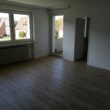 Schöne Seniorenwohnung mit Balkon im OG - Wohnzimmer